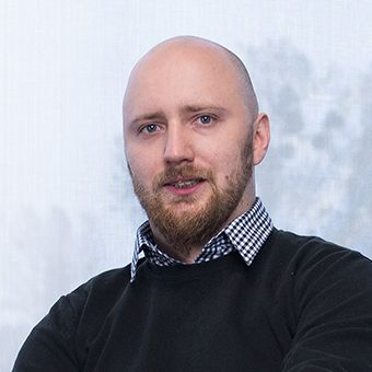 A portrait photo of Andrzej